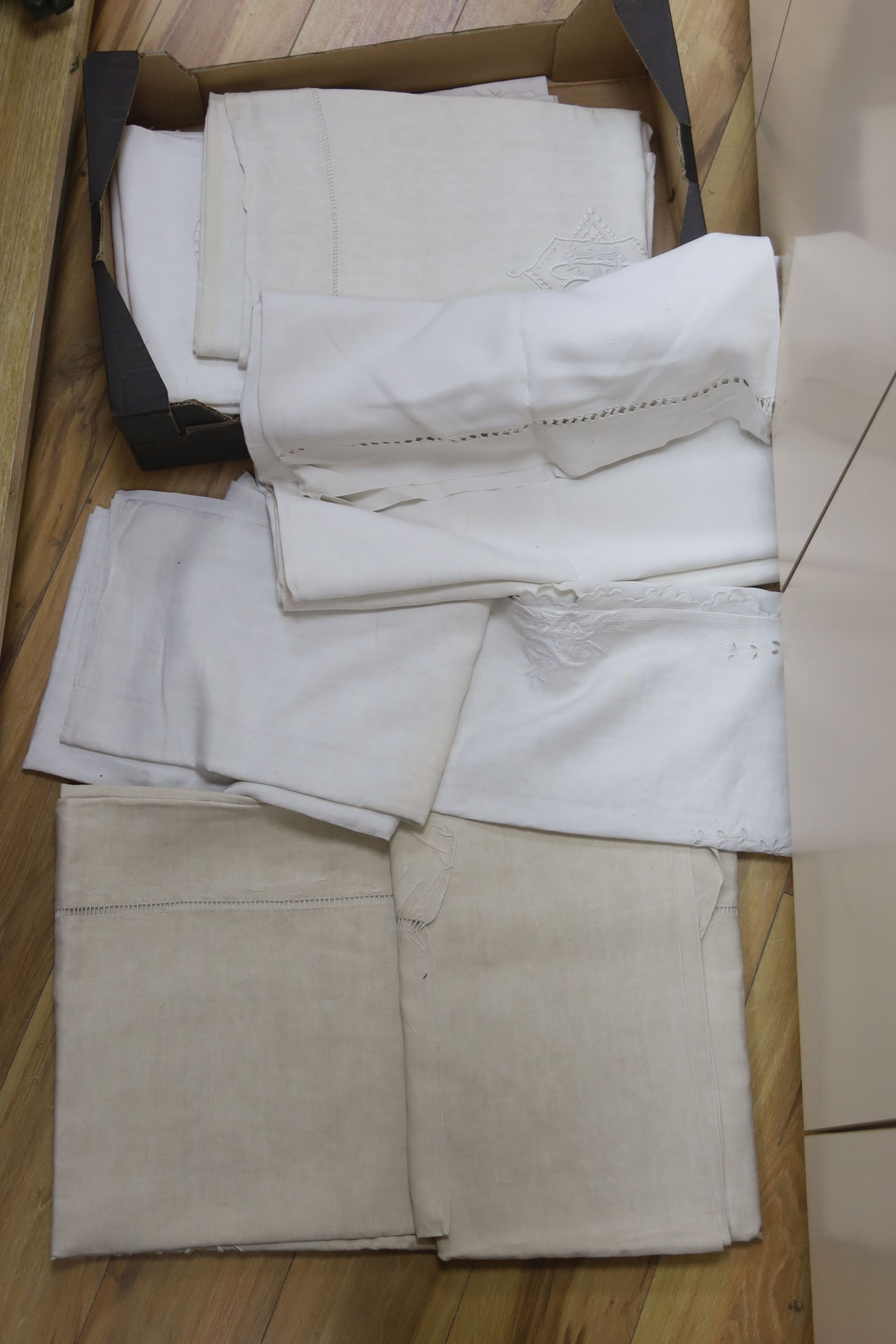 Six French provincial embroidered and cutworked sheets